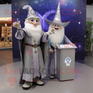 Silver Wizard mascot costume character dressed with a Henley Shirt and Brooches