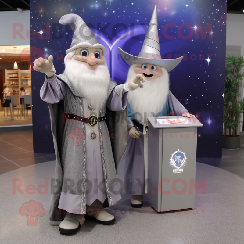 Silver Wizard mascot costume character dressed with a Henley Shirt and Brooches Silver Wizard mascot costume character dressed with a Henley Shirt and Brooches