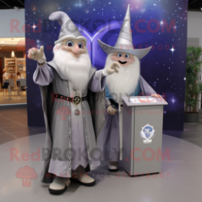 Silver Wizard mascot costume character dressed with a Henley Shirt and Brooches