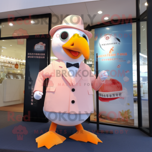 Peach Seagull mascot costume character dressed with a Suit and Keychains