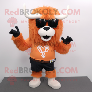 Peach Yak mascot costume character dressed with a V-Neck Tee and Sunglasses