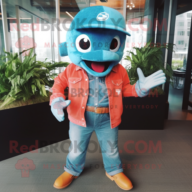 Turquoise Salmon mascot costume character dressed with a Denim Shirt and Gloves Turquoise Salmon mascot costume character dressed with a Denim Shirt and Gloves