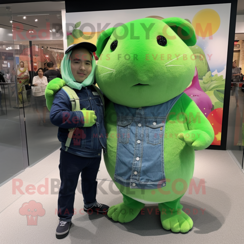 Green Guinea Pig mascot costume character dressed with a Boyfriend Jeans and Wraps