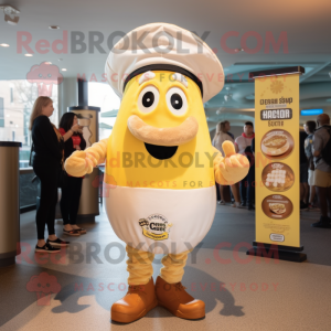Gold Clam Chowder mascot costume character dressed with a Graphic Tee and Berets