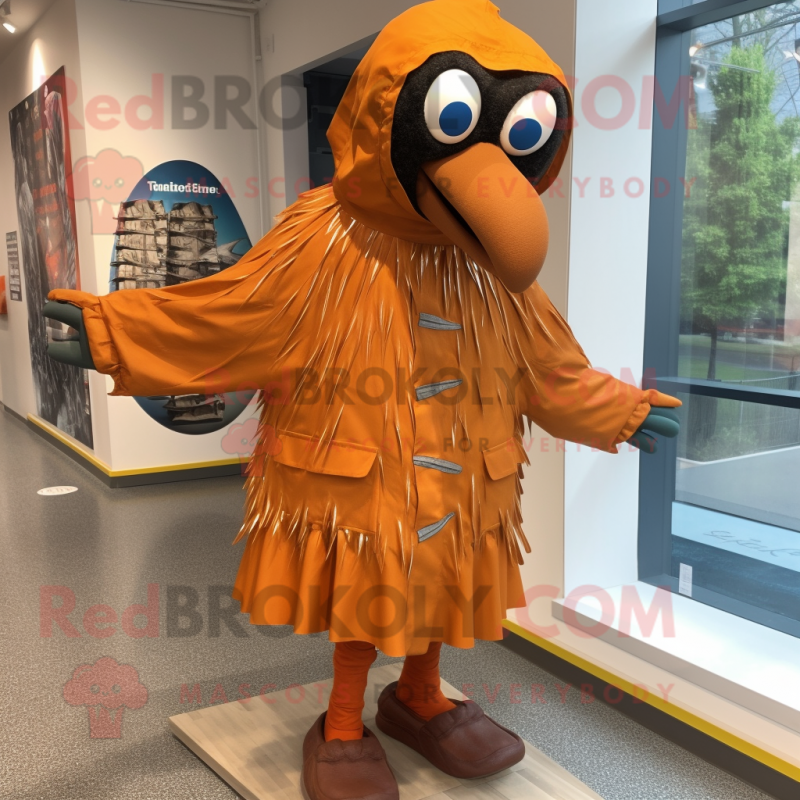 Rust Peacock mascot costume character dressed with a Raincoat and Shoe laces