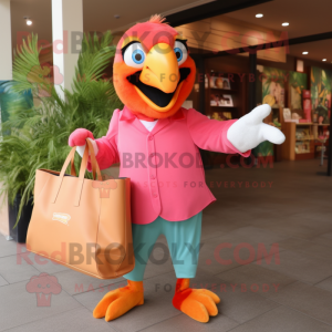 Peach Macaw mascot costume character dressed with a Suit Pants and Tote bags