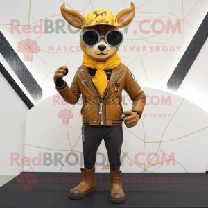 Gold Deer mascot costume character dressed with a Moto Jacket and Scarf clips