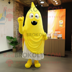 Lemon Yellow Goulash mascot costume character dressed with a V-Neck Tee and Shawl pins