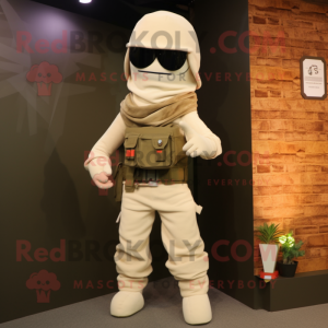 Cream Para Commando mascot costume character dressed with a Jeans and Shawl pins