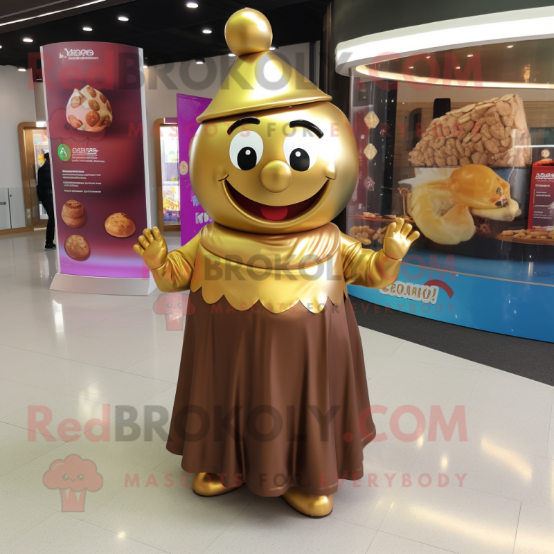 Gold Chocolates mascot costume character dressed with a Maxi Dress and Headbands Gold Chocolates mascot costume character dressed with a Maxi Dress and Headbands