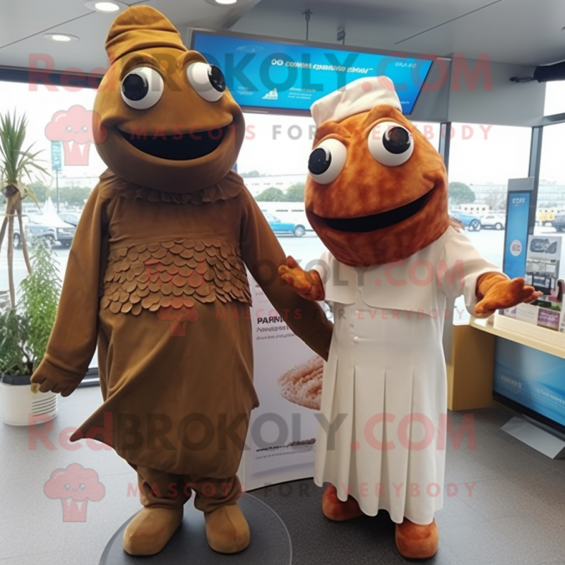 Brown Fish And Chips mascot costume character dressed with a Empire Waist Dress and Cufflinks