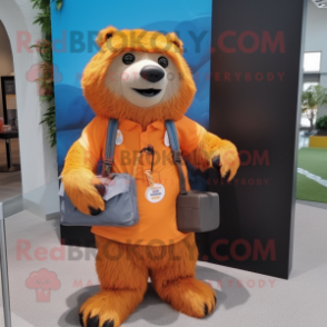 Orange Sloth Bear mascot costume character dressed with a Oxford Shirt and Messenger bags