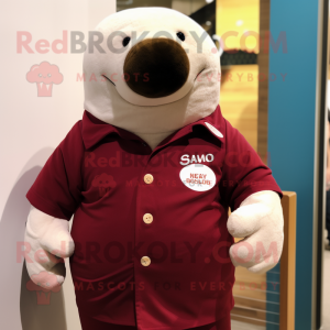 Maroon Stellar'S Sea Cow mascot costume character dressed with a Button-Up Shirt and Lapel pins