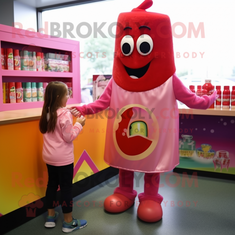 Pink Bottle Of Ketchup mascot costume character dressed with a Long Sleeve Tee and Watches