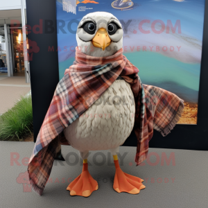 Tan Seagull mascot costume character dressed with a Flannel Shirt and Shawls