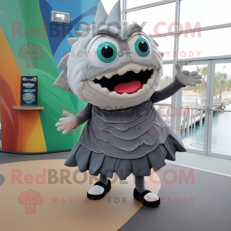 Gray Piranha mascot costume character dressed with a A-Line Skirt and Hair clips Gray Piranha mascot costume character dressed with a A-Line Skirt and Hair clips