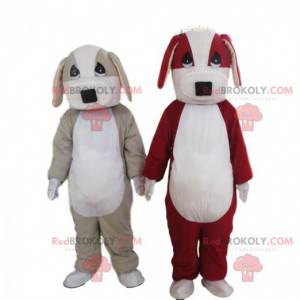 2 mascottes de chiens, un gris et blanc et un rouge et blanc -