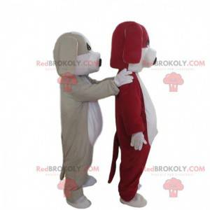 2 mascottes de chiens, un gris et blanc et un rouge et blanc -