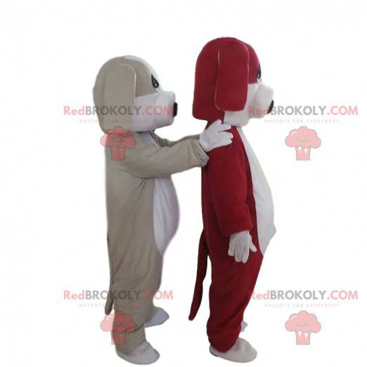 2 mascottes de chiens, un gris et blanc et un rouge et blanc -