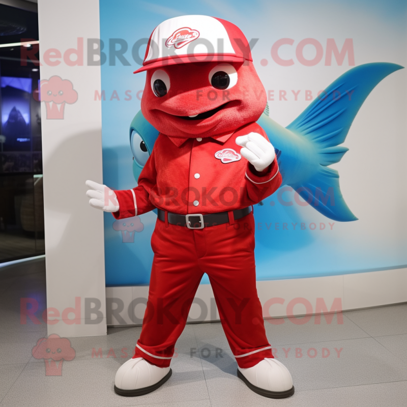 Red Tuna mascot costume character dressed with a Suit Pants and Caps