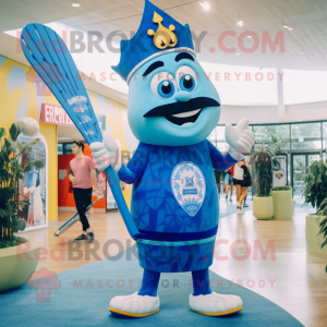 Blue King mascot costume character dressed with a Board Shorts and Berets