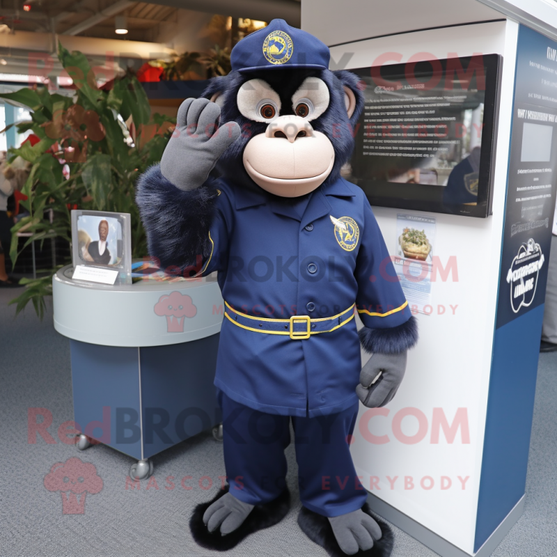 Navy Chimpanzee mascot costume character dressed with a Long Sleeve Tee and Keychains