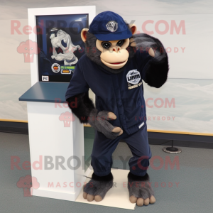 Navy Chimpanzee mascot costume character dressed with a Long Sleeve Tee and Keychains