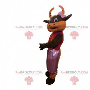 Brown and orange cow mascot dressed in a pink dress -