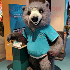 Teal Sloth Bear mascot costume character dressed with a T-Shirt and Lapel pins