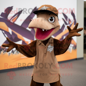 Brown Pterodactyl mascot costume character dressed with a Polo Shirt and Caps