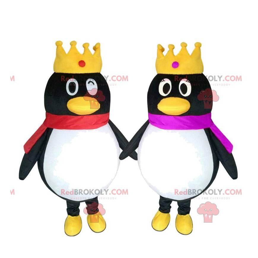 2 penguin mascots with crowns, couple of penguins -