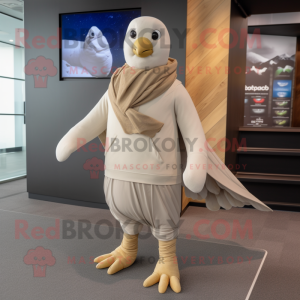 Beige Dove mascot costume character dressed with a Joggers and Scarves