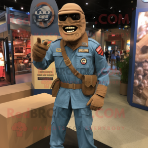 Brown Gi Joe mascot costume character dressed with a Chambray Shirt and Wraps