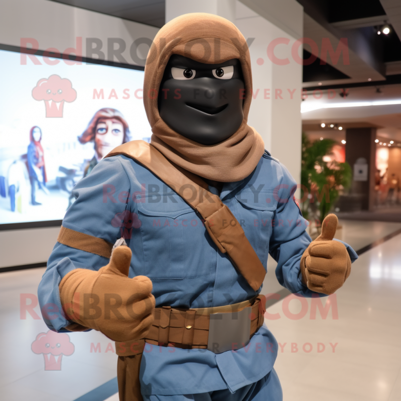 Brown Gi Joe mascot costume character dressed with a Chambray Shirt and Wraps Brown Gi Joe mascot costume character dressed with a Chambray Shirt and Wraps