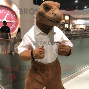 Brown Komodo Dragon mascot costume character dressed with a Dress Shirt and Bracelet watches