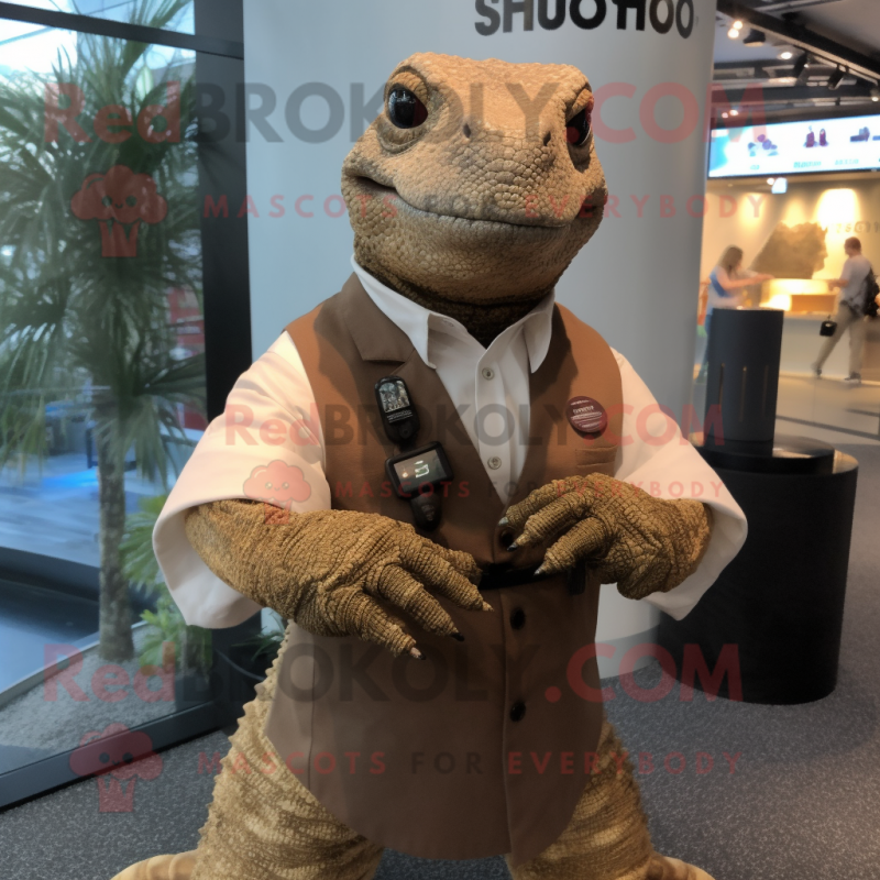 Brown Komodo Dragon mascot costume character dressed with a Dress Shirt and Bracelet watches