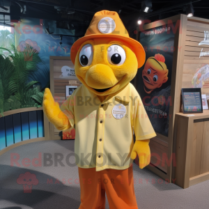 Yellow Clown Fish mascot costume character dressed with a Henley Shirt and Hat pins
