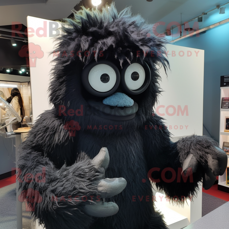 Black Yeti mascot costume character dressed with a Dress Shirt and Eyeglasses Black Yeti mascot costume character dressed with a Dress Shirt and Eyeglasses
