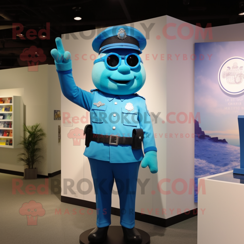 Cyan Police Officer mascot costume character dressed with a Polo Tee and Earrings Cyan Police Officer mascot costume character dressed with a Polo Tee and Earrings