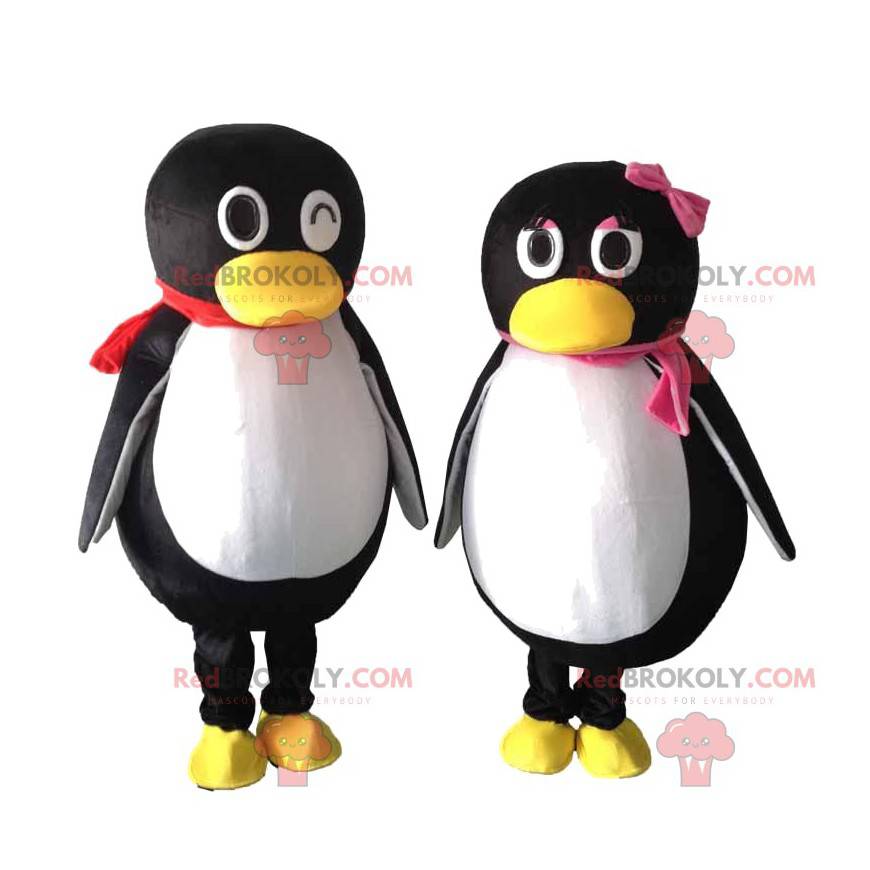 2 mascotes de pinguins pretos e brancos, um casal de pinguins -