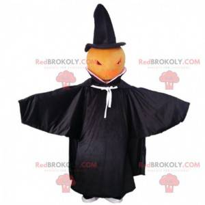 Mascotte de citrouille avec une cape noire, costume d'Halloween