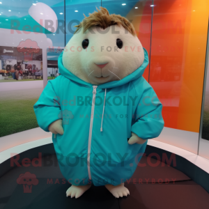 Turquoise Guinea Pig mascot costume character dressed with a Windbreaker and Suspenders
