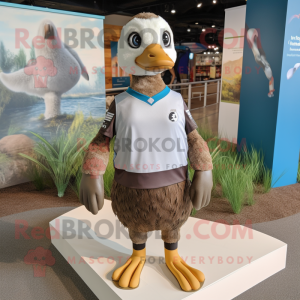 Brown Gosling mascot costume character dressed with a Rash Guard and Anklets