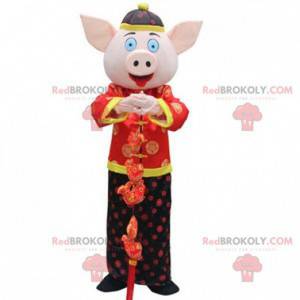 Schweinekostüm im traditionellen asiatischen Outfit -