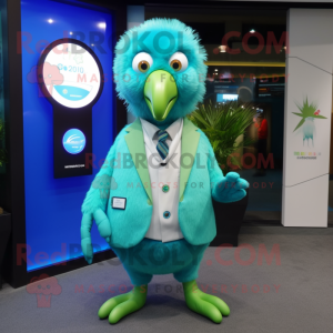 Cyan Kiwi mascot costume character dressed with a Suit and Keychains