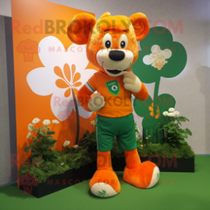 Orange Bunch Of Shamrocks mascot costume character dressed with a Rugby Shirt and Pocket squares