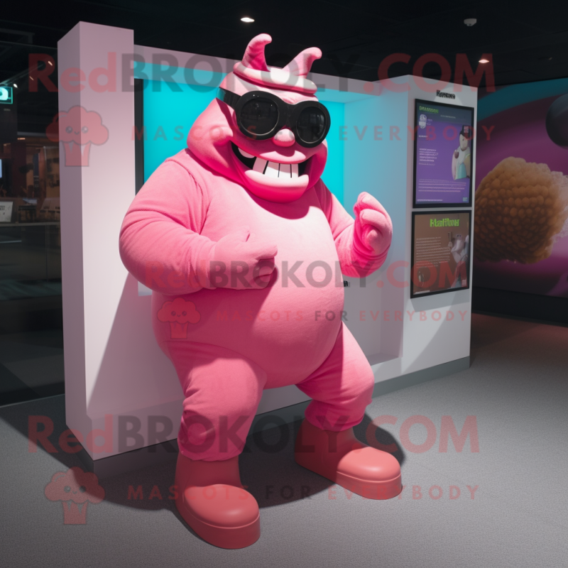 Pink Ogre mascot costume character dressed with a Turtleneck and Sunglasses Pink Ogre mascot costume character dressed with a Turtleneck and Sunglasses