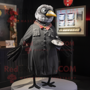 Silver Blackbird mascot costume character dressed with a Blouse and Lapel pins