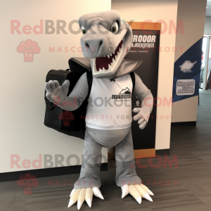 Gray Spinosaurus mascot costume character dressed with a Hoodie and Briefcases