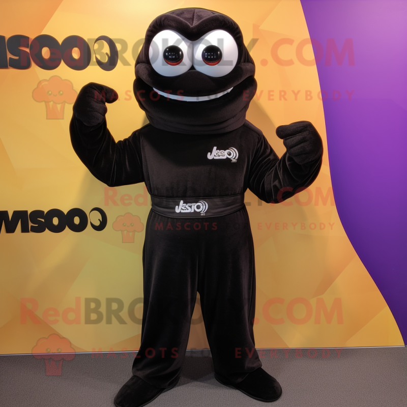 Black Moussaka mascot costume character dressed with a Turtleneck and Cufflinks Black Moussaka mascot costume character dressed with a Turtleneck and Cufflinks